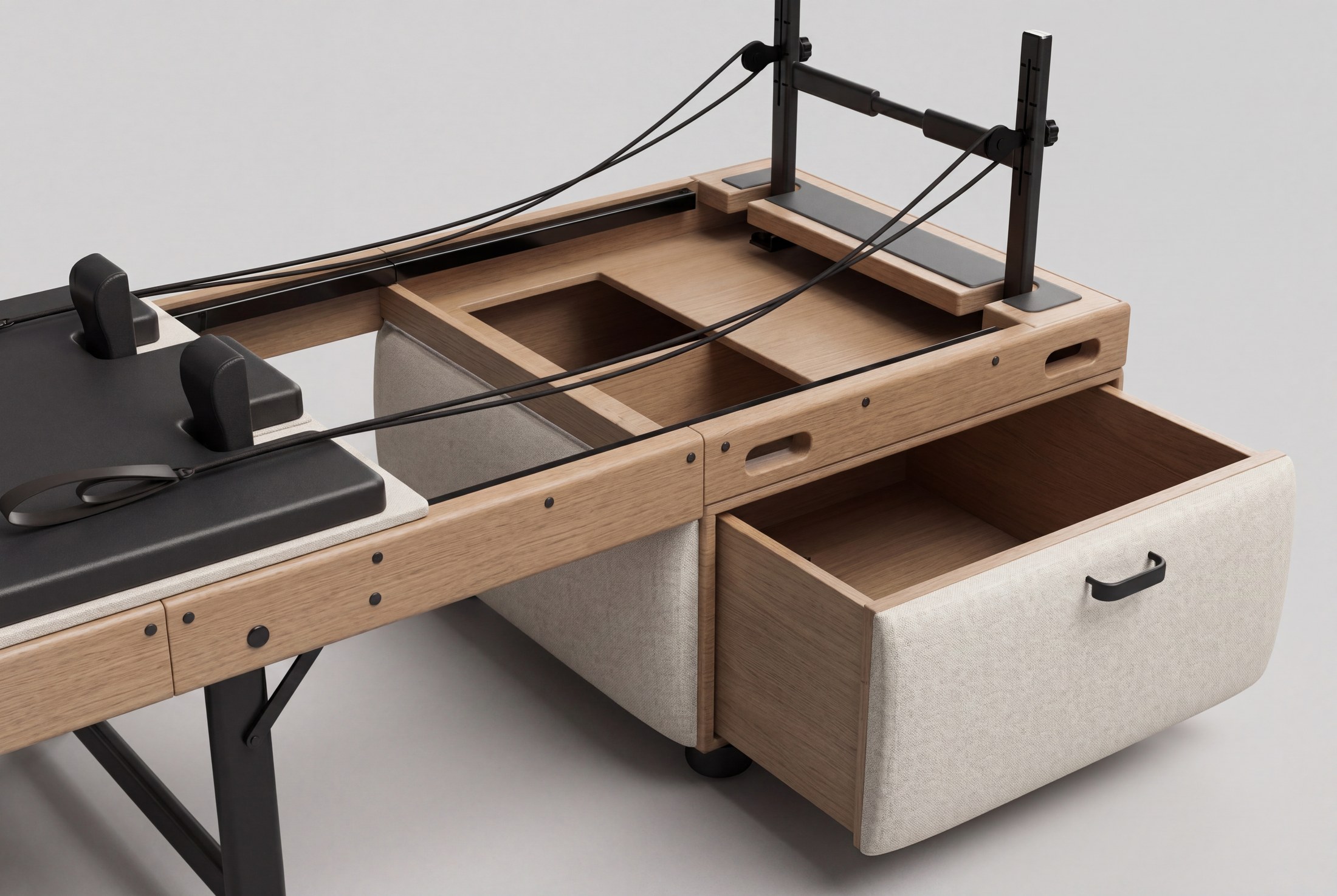 FORMÄ reformer ottoman — unfolded reformer with drawer pulled out, light oak and cream linen